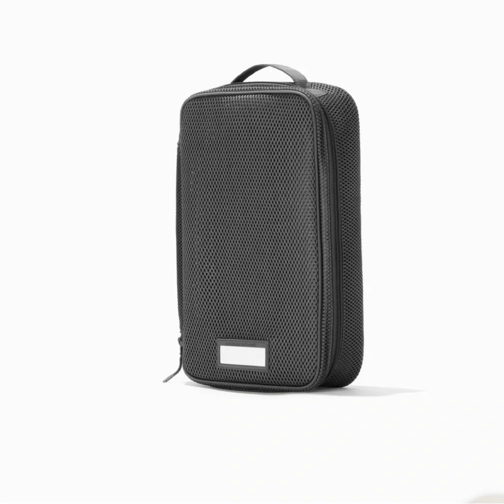 NWT: Dagne Dover Roma Packing Cube in color Carbon Air Mesh and size Medium